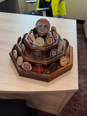 Front view of the finished three-tier black walnut challenge coin display with removable featured-coin holder. Coins not included.