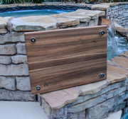 Underside of cutting board showing four 1 in stainless steel feet